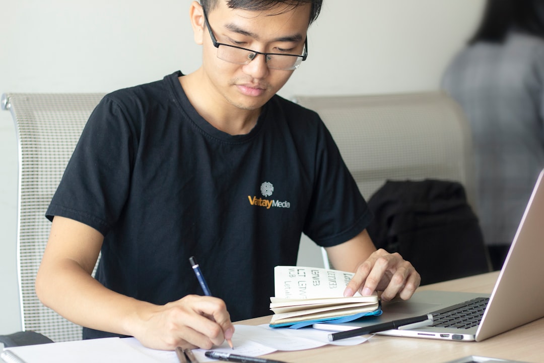 why-choose-us Mr. Trung, our Design Team Leader is sketching his ideas for a brand logo